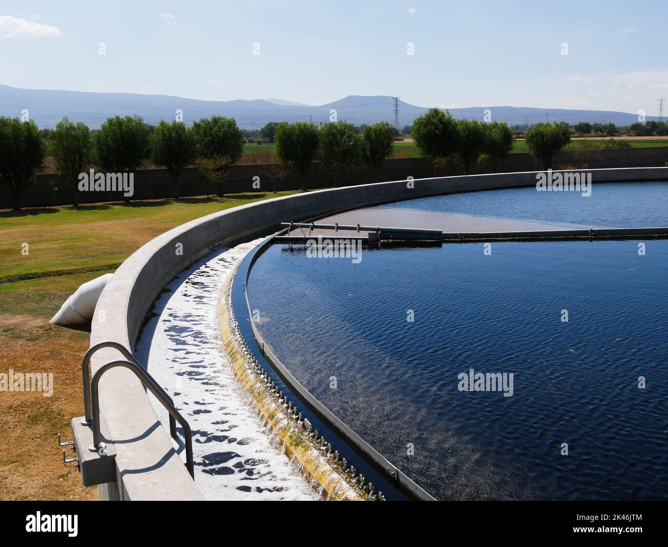 weirs on a clarification tank in a waste water treatment plant Stock Photo Alamy