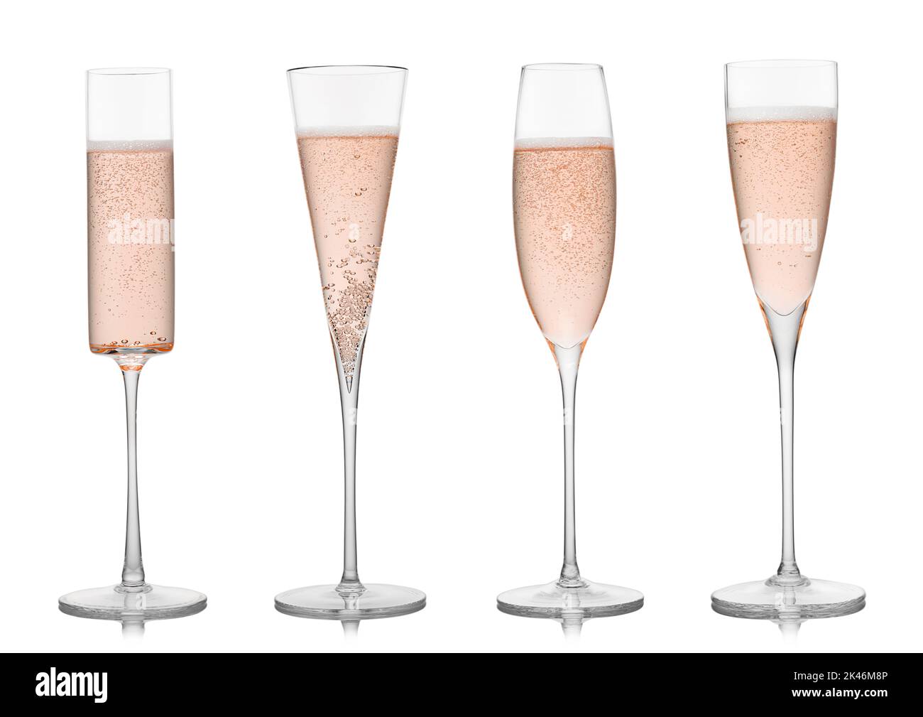 Various handmade rose pink champagne glasses on white background with