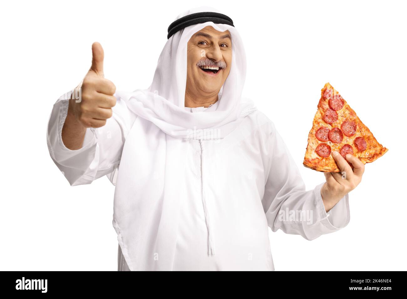 Happy mature arab man holding a slice of pepperoni pizza and gesturing thumbs up isolated on white background Stock Photo