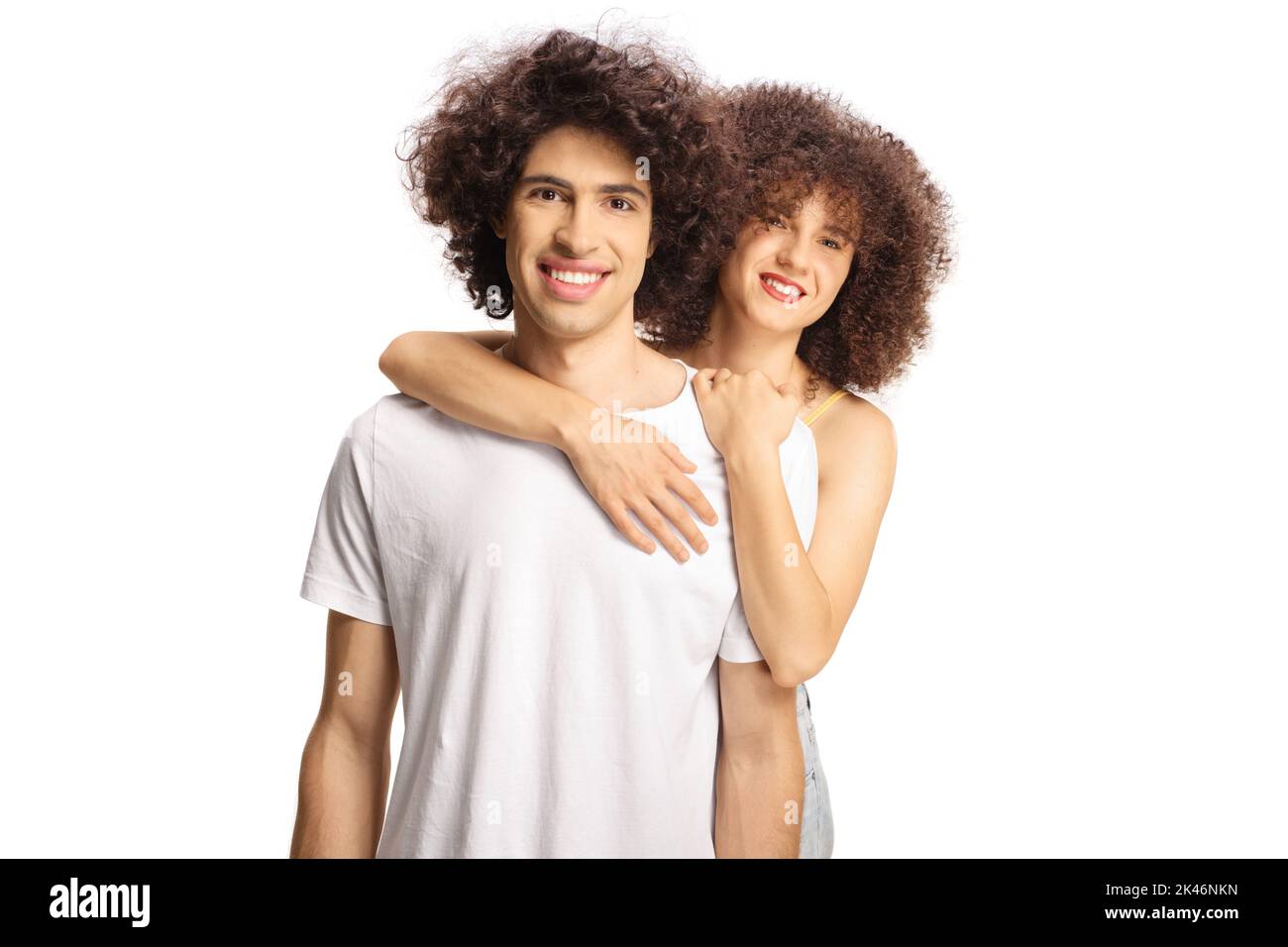 Cute couple with curly hair in embrace isolated on white background Stock Photo