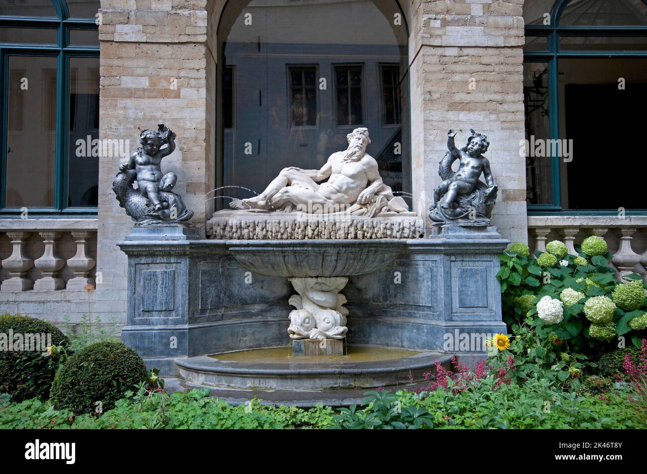 Fountain with statues in the courtyard of the Town Hall (Hotel de Ville), Brussels, Belgium Stock Photo