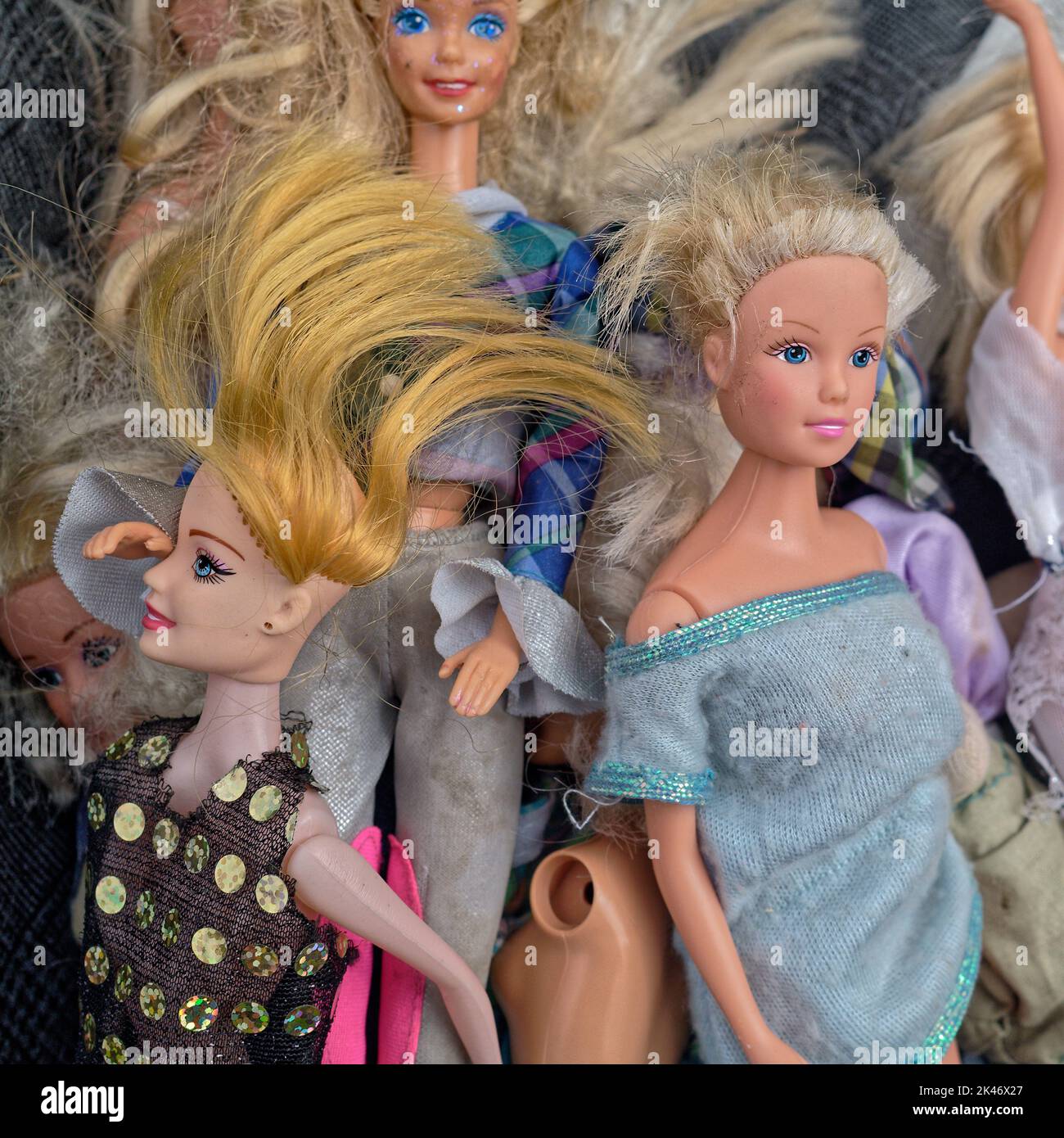 Cute dolls with tousled hairstyles Stock Photo