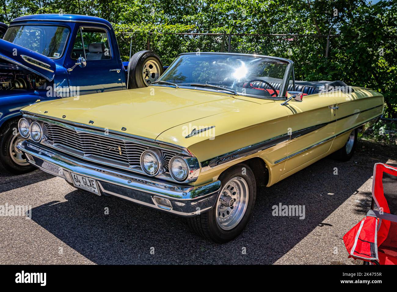 Falcon Heights, MN - June 18, 2022: High perspective front corner view of a 1964 Ford Galaxie 500 Convertible at a local car show. Stock Photo