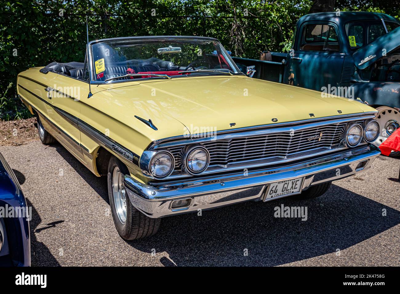 Falcon Heights, MN - June 18, 2022: High perspective front corner view of a 1964 Ford Galaxie 500 Convertible at a local car show. Stock Photo