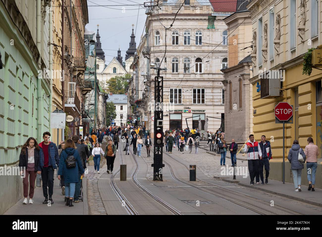 Pedestrians fill the streets in bustling Lviv, Ukraine during wartime Stock Photo