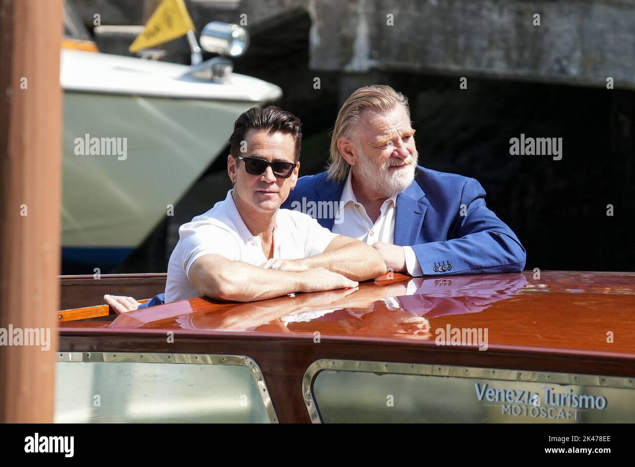 Colin Farrell and Brendan Gleeson are seen during the 79th Venice International Film Festival at Darsena Excelsior in Venice. Stock Photo