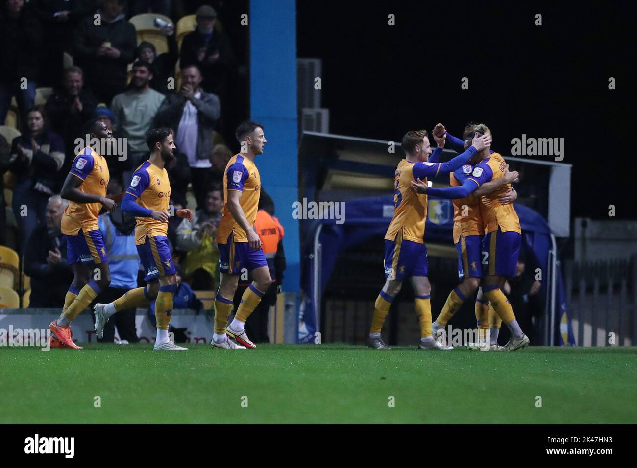 George Lapslie of Mansfield Town celebrates with his team mates after scoring their first goal the Sky Bet League 2 match between Mansfield Town and Hartlepool United at the One Call Stadium, Mansfield on Friday 30th September 2022. (Credit: Mark Fletcher | MI News) Credit: MI News & Sport /Alamy Live News Stock Photo