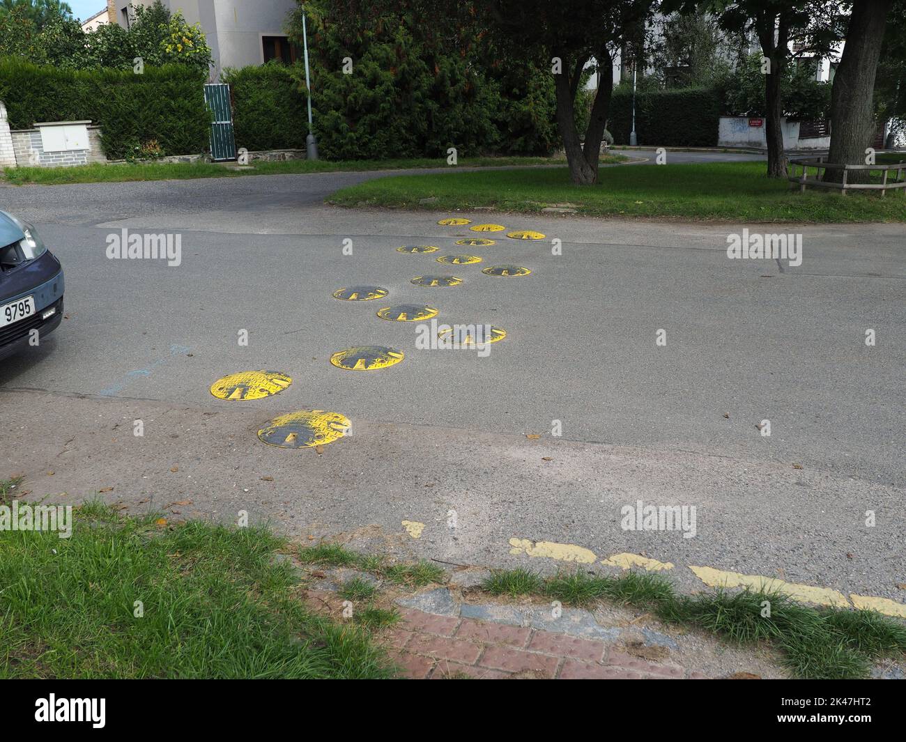 Flat circular metal speed bumps (traffic thresholds, speed breakers, speed hump, cushion, table