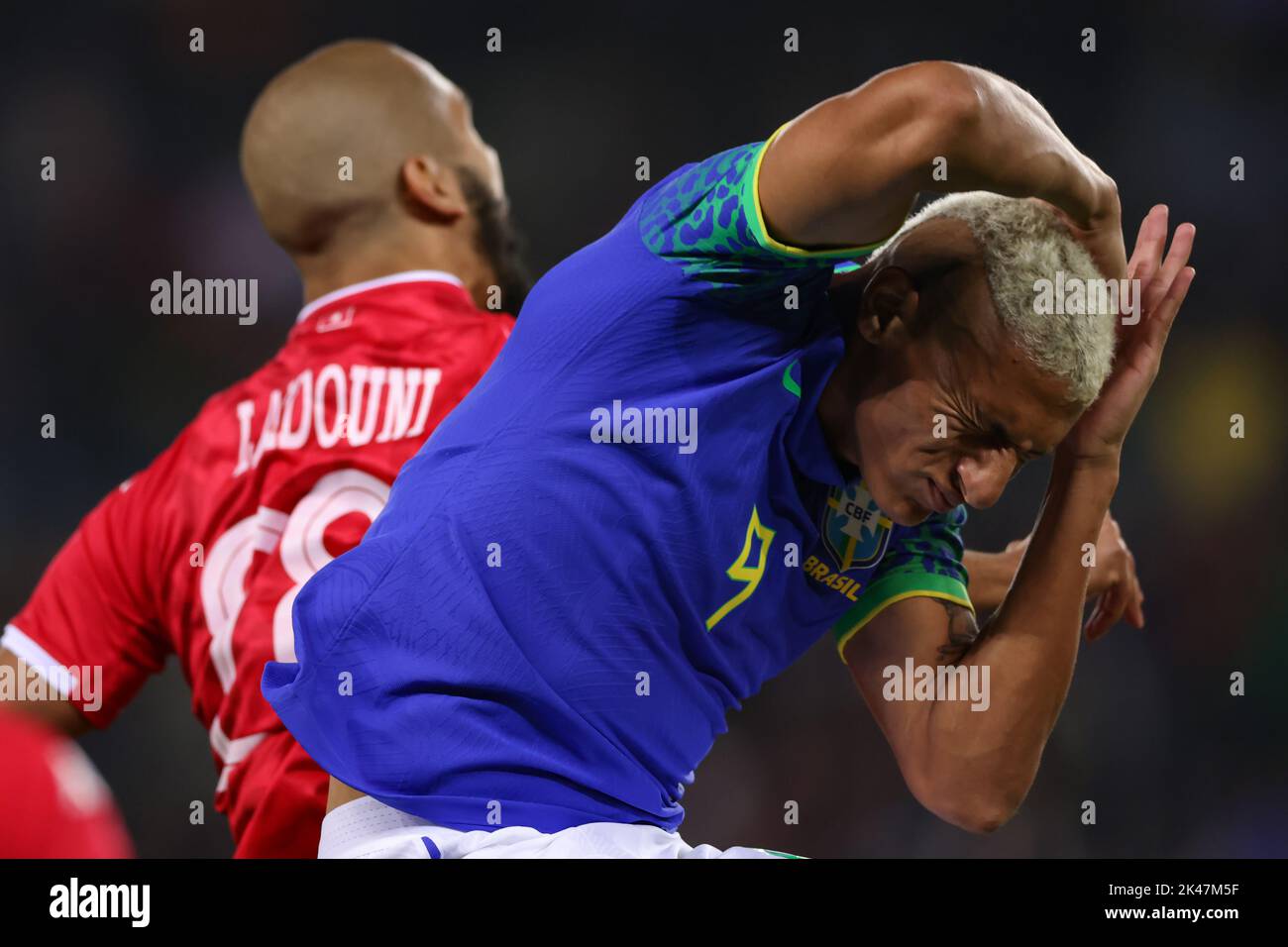 Paris, France, 27th September 2022. Richarlison of Brazil clashes with Aissa Bilal Laidouni of Tunisia during the International Friendly match at Le Parc des Princes, Paris. Picture credit should read: Jonathan Moscrop / Sportimage Stock Photo