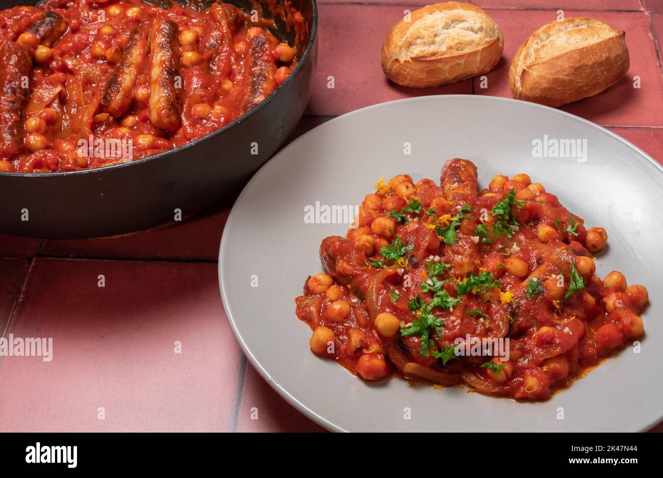Easy sausage casserole with bread rolls Stock Photo
