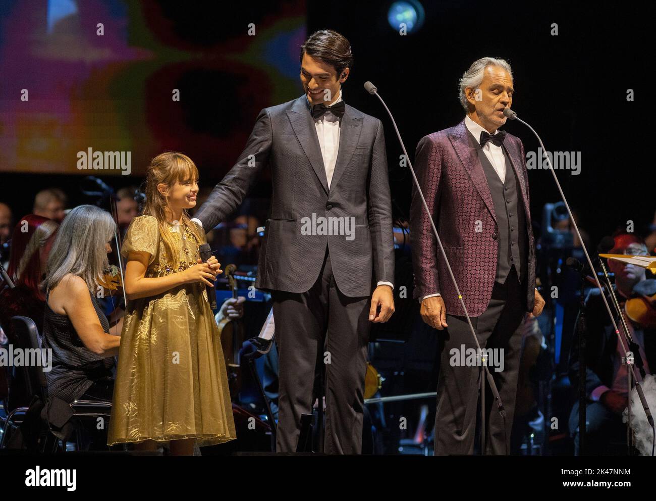 Italian tenor Andrea Bocelli (right) performs with his daughter Virginia Bocelli and his son Matteo Bocelli at the O2 Arena, Greenwich Peninsula in south London. Picture date: Friday September 30, 2022. Stock Photo