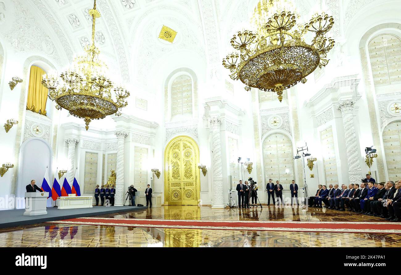 Moscow, Russia. 30th Sep, 2022. Russian President Vladimir Putin (L) attends a ceremony to sign treaties formally annexing four regions of Ukraine currently occupied by Russian troops - Lugansk, Donetsk, Kherson and Zaporizhzhia, at the Kremlin in Moscow, Russia on Friday, September 30, 2022. Separatist leaders of annexed Donetsk, Lugansk, Kherson and Zaporizhzhya regions have arrived in Moscow to sign treaties to begin the process of absorbing parts of Ukraine into Russia. Photo by Kremlin Pool/UPI Credit: UPI/Alamy Live News Stock Photo