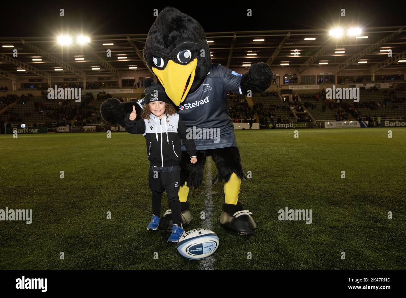 Newcastle, UK. 10th Sep, 2022. Falcons mascot for the day Merlin is pictured with Flash The Falcon after delivering the match ball for the Gallagher Premiership match between Newcastle Falcons and Bristol at Kingston Park, Newcastle on Friday 30th September 2022. (Credit: Chris Lishman | MI News) Credit: MI News & Sport /Alamy Live News Stock Photo
