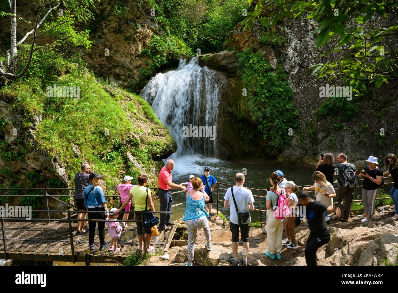 Kislovodsk, Russia - July 26, 2022: Honey Waterfalls in summer, people visit tourist attraction. Water falls in mountains. Theme of nature, travel, to Stock Photo