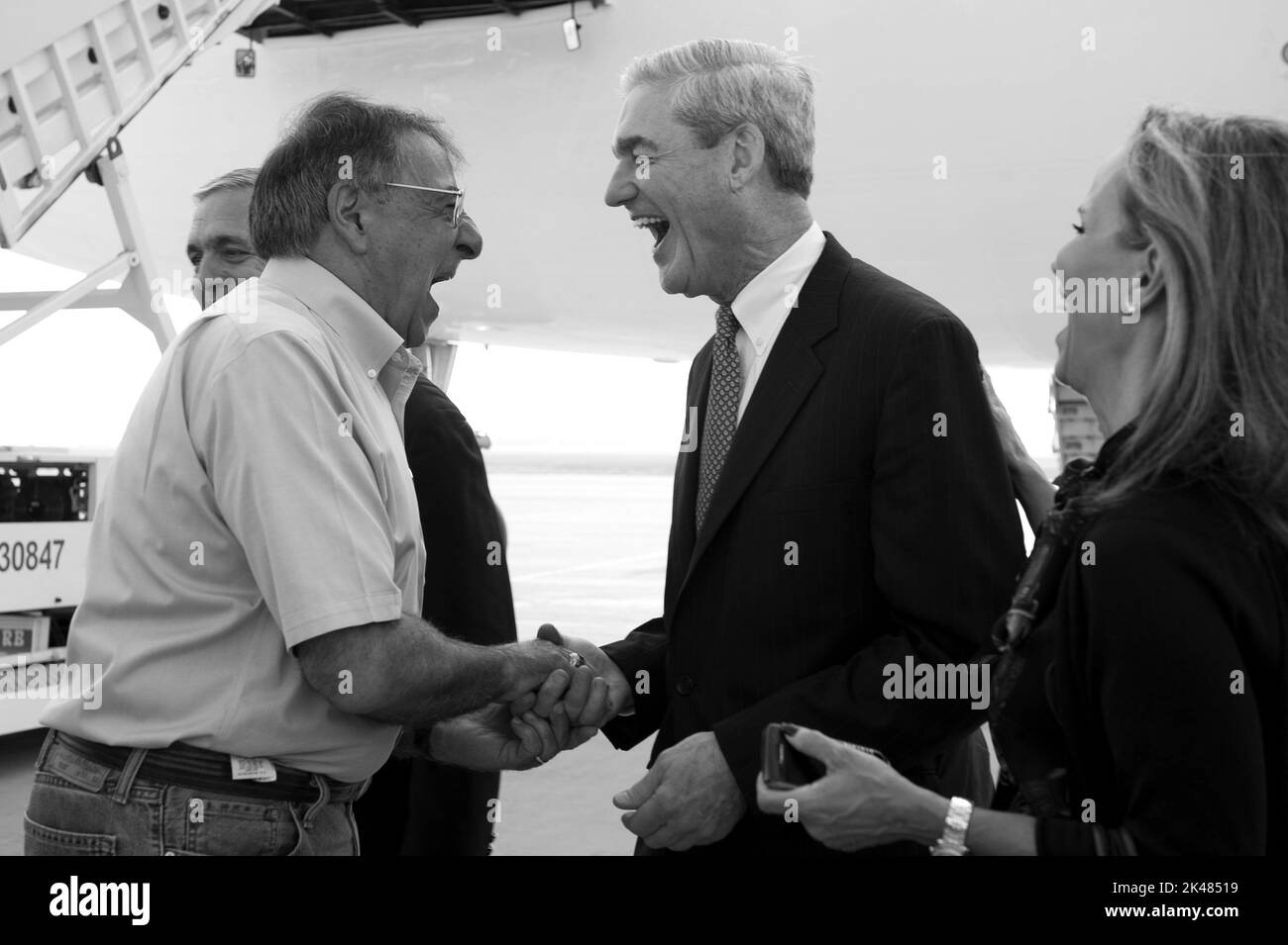 Secretary of Defense Leon E. Panetta laughs with FBI director, Robert Mueller,  before departing Jeddah, Saudi Arabia  June 21, 2012.  DoD photo by Erin A. Kirk-Cuomo Stock Photo