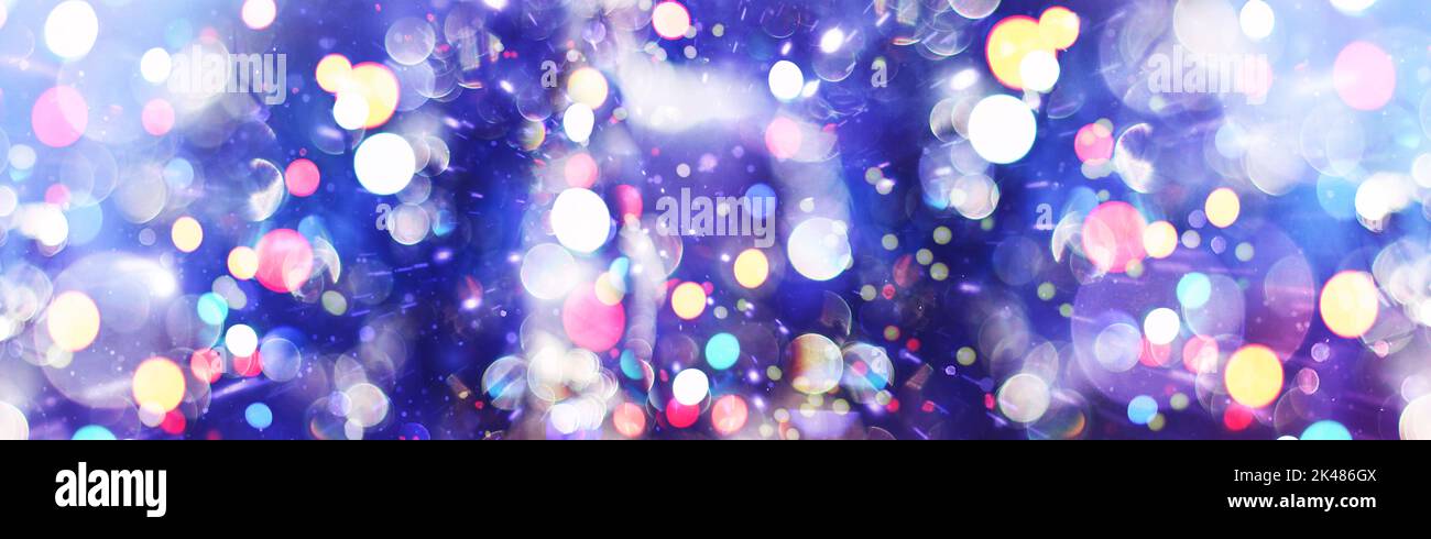 Abstract light celebration background with defocused golden lights for ...