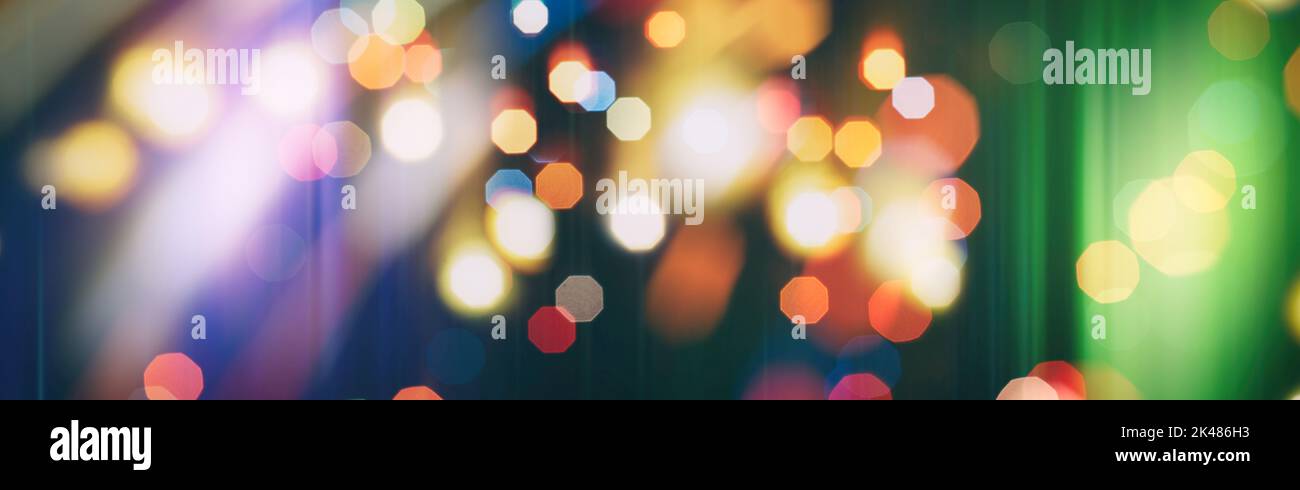 Abstract light celebration background with defocused golden lights for ...