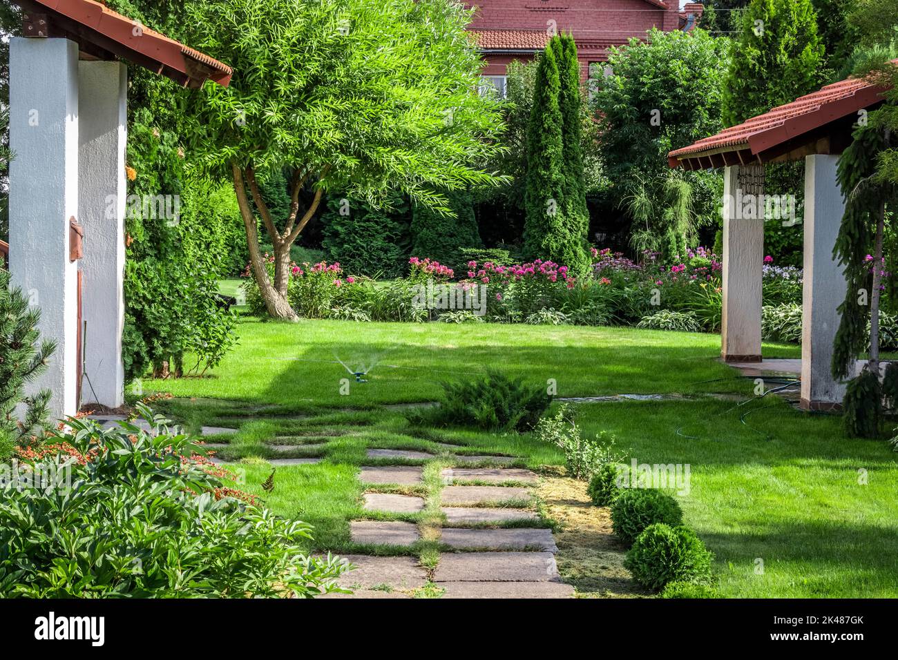 Backyard design elements of a beautiful private house. Stock Photo