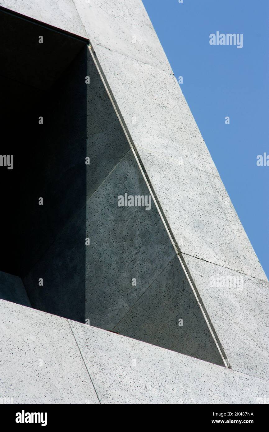 A minimal photo of concrete building with geometric forms. Modern concrete construction. Stock Photo