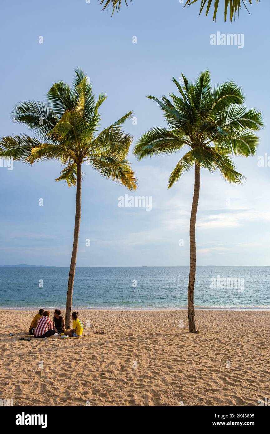 palm trees on the beach Beach Jomtien Pattaya Thailand during afternoon sunset.  Stock Photo