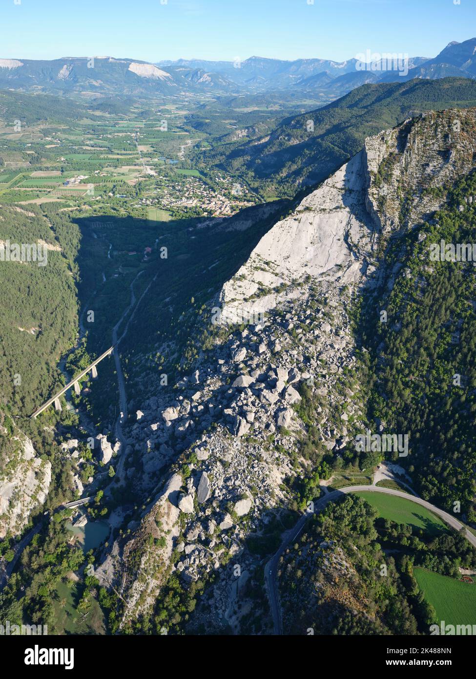 AERIAL VIEW. Historic landslide in the upper Drôme Valley. It occured in 1442, and created two lakes, now drained. Le Claps, Luc-en-Diois, France. Stock Photo