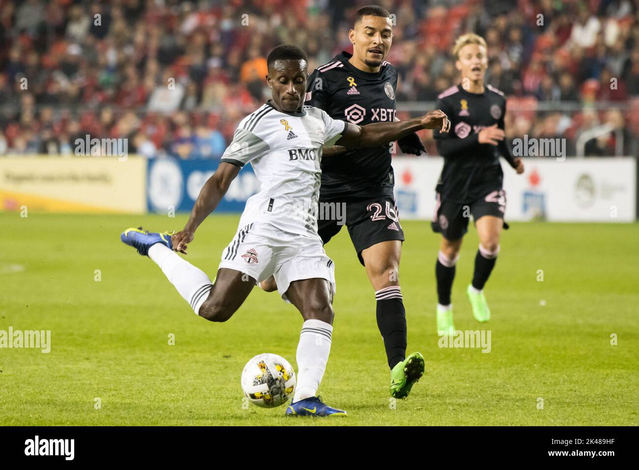 Toronto, Canada. 30th Sep, 2022. Gregore de Magalhaes da Silva #26 (R) of Inter Miami and Richie Laryea #19 (L) of Toronto FC seen in action during the MLS game between Toronto FC and Inter Miami CF at BMO field in Toronto. The game ended 0-1 Inter Miami win. Credit: SOPA Images Limited/Alamy Live News Stock Photo