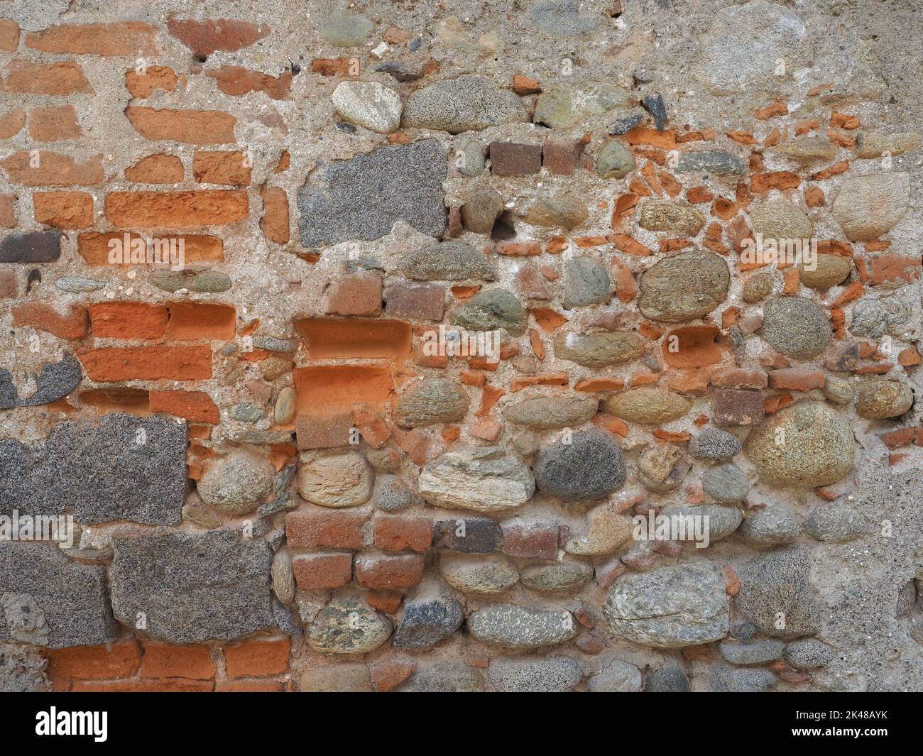 red bricks and stones wall useful as a background Stock Photo