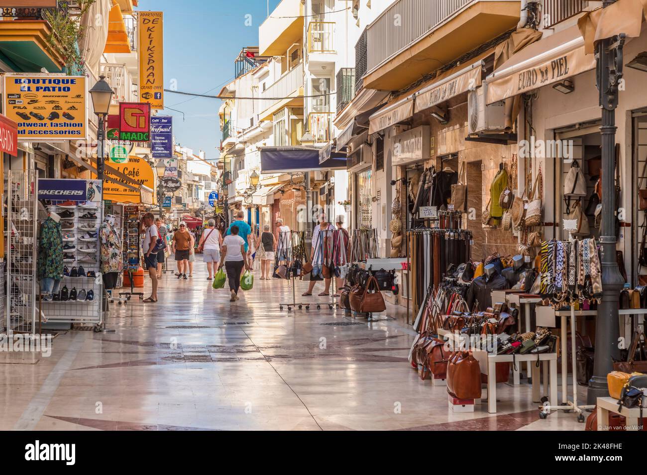 Cozy street with small shops, restaurants and bars in the La Carihuela area of Torremolinos town. Stock Photo