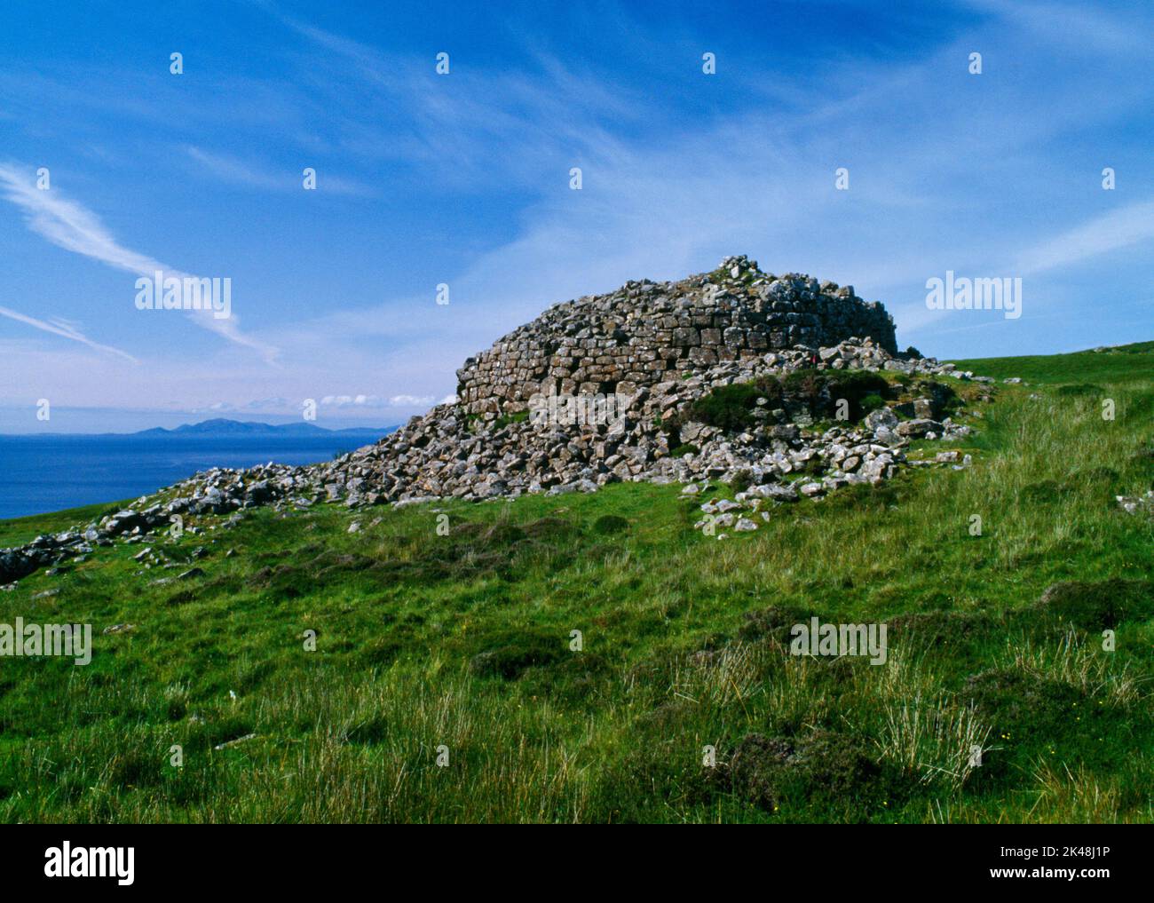 Dun Borrafiach ruined Iron Age broch tower, Waternish, Isle of Skye, Scotland, UK, looking N across the Little Minch to the Outer Hebrides. Stock Photo