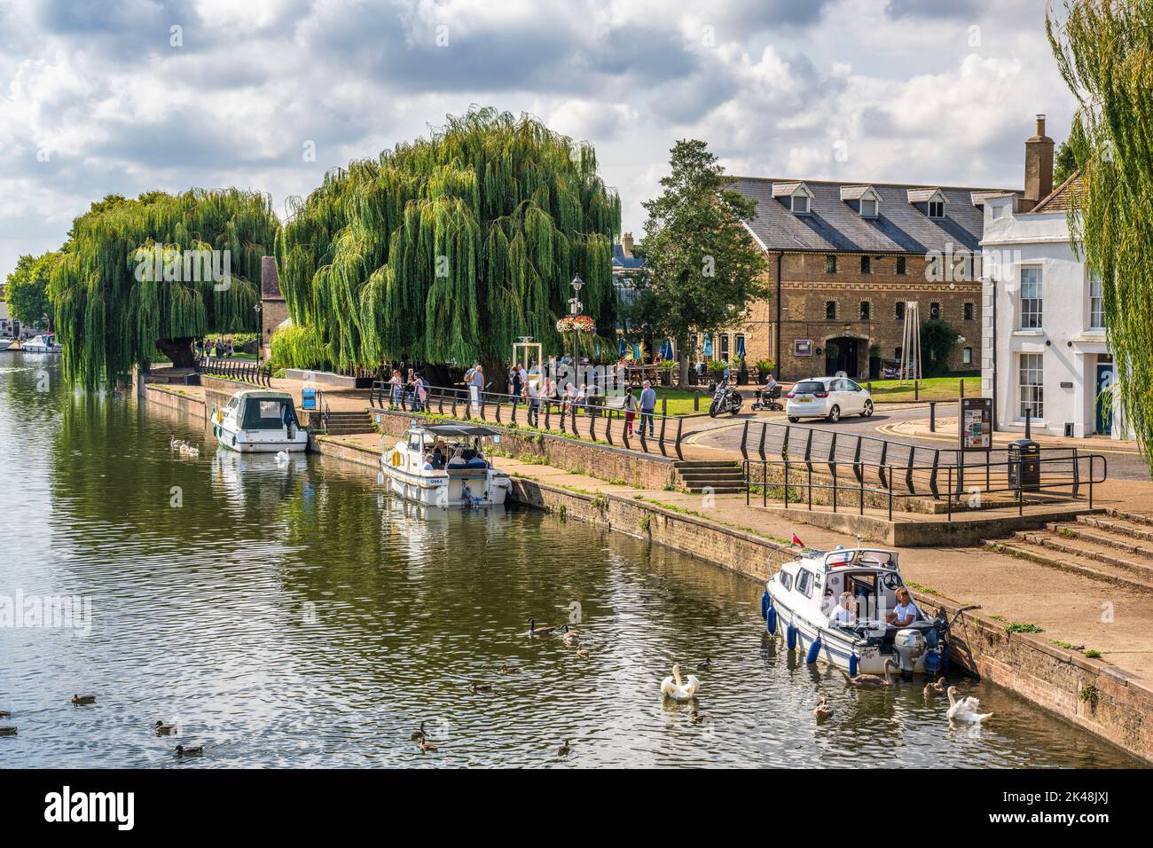 Boats moored on the River Great Ouse viewed from the Babylon Bridge in Ely, Cambridgeshire, England, UK Stock Photo