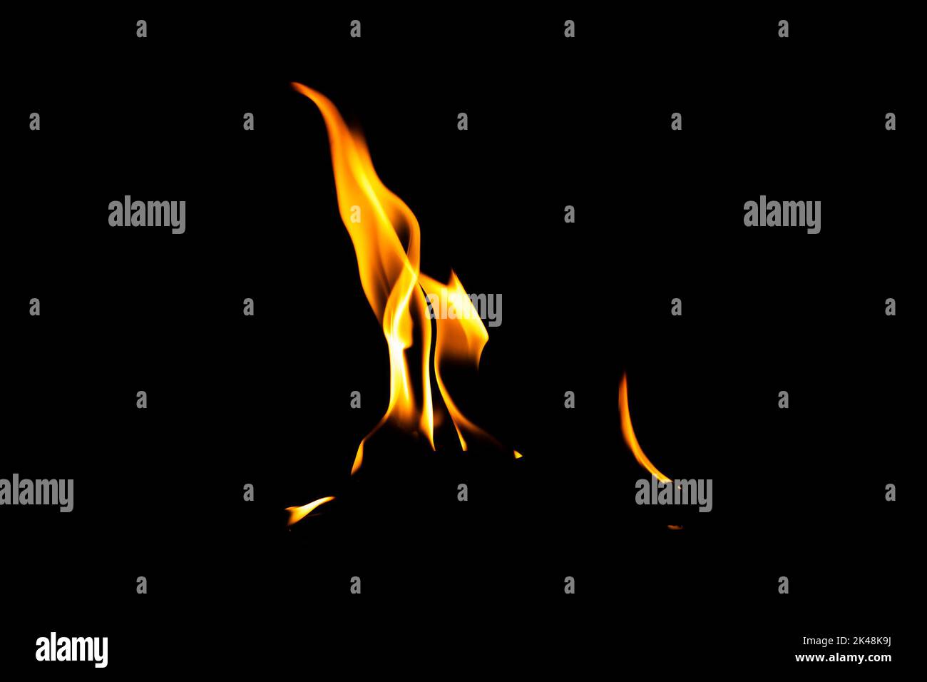 Fire flame texture. Burning material backdrop. Burn effect pattern. Blaze and torch wallpaper. Heat and haze backdrop. Exploison and hot background. Stock Photo
