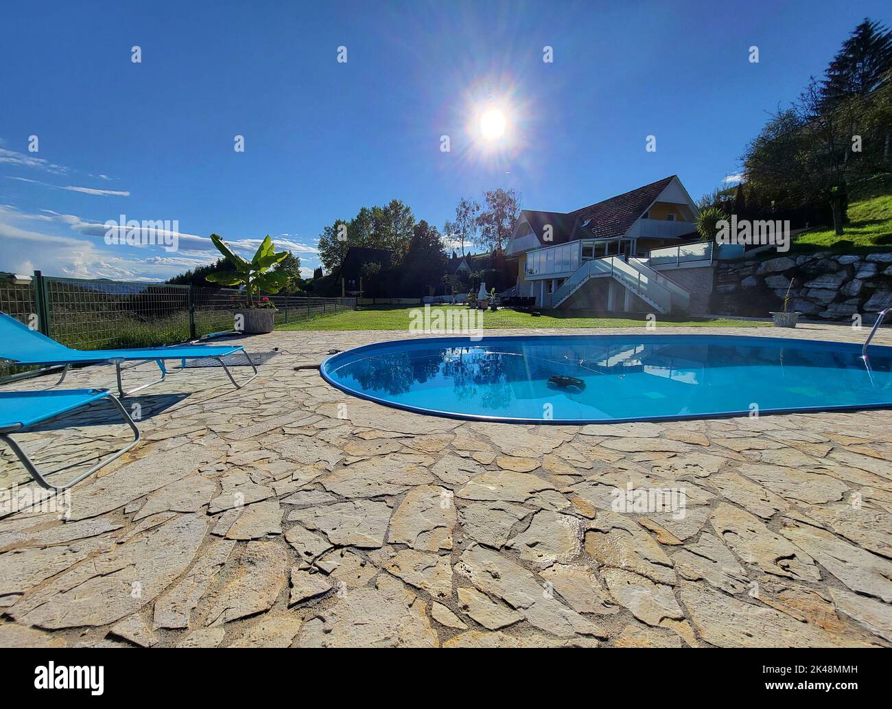 Kitzeck im Sausal, Austria - September 20, 2022: Guesthouse with pool in thy mountain village in Southern Styria, the area is well known for special w Stock Photo