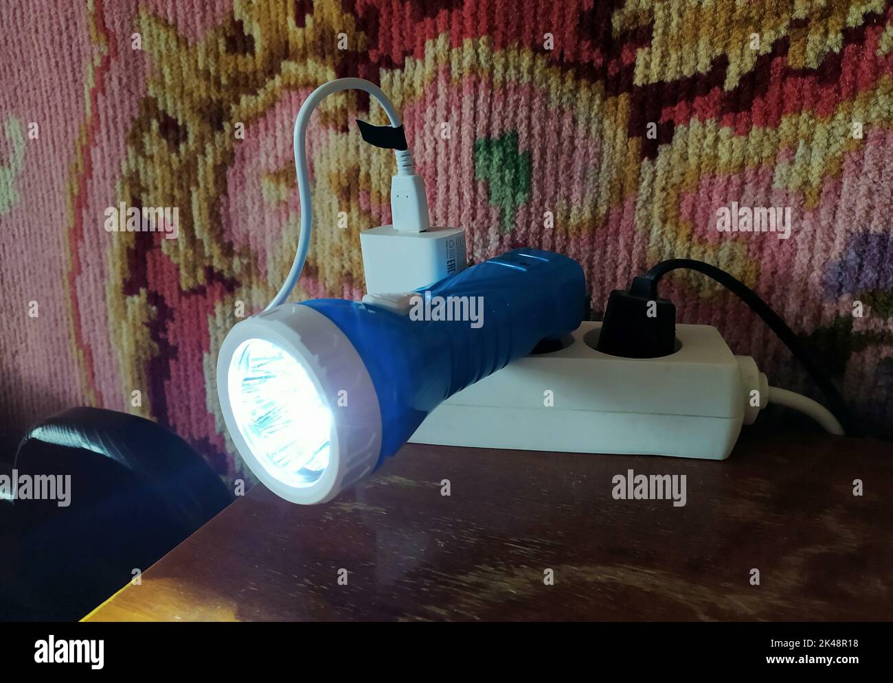 Flashlight Socket Electric flashlight on the battery, sockets and charger for smartphones ...