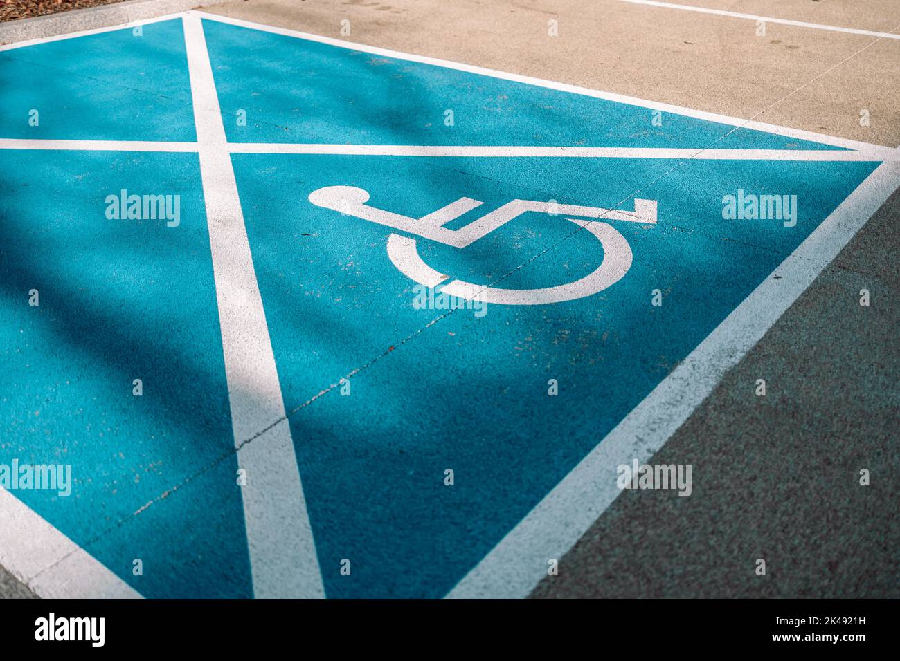 Handicapped symbol on parking space Stock Photo Alamy