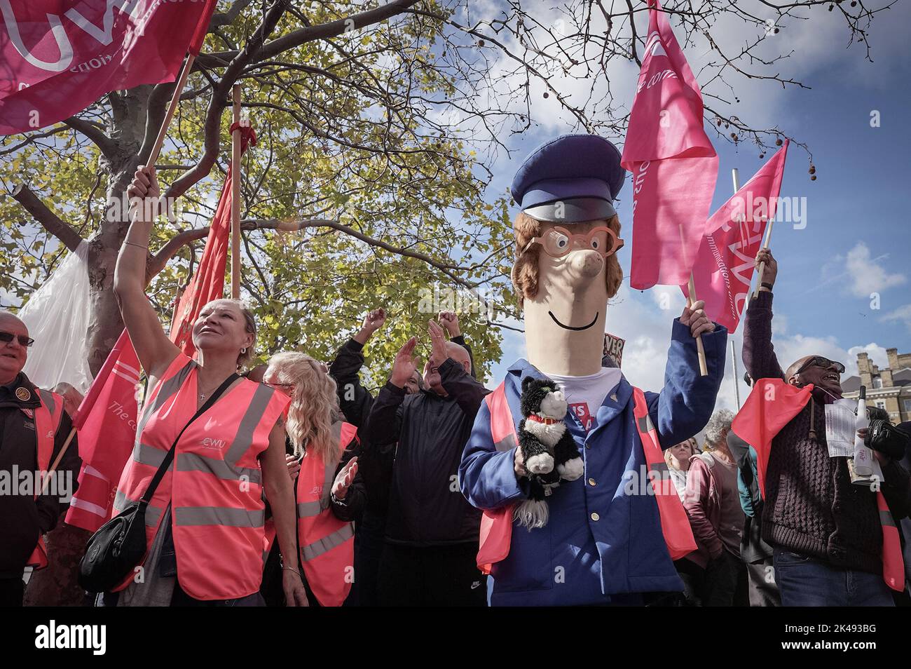 London, UK. 1st October, 2022. Striking postmen, dressed as Postman Pat join Enough is Enough trade union protest and rally outside Kings Cross station. Credit: Guy Corbishley/Alamy Live News Stock Photo
