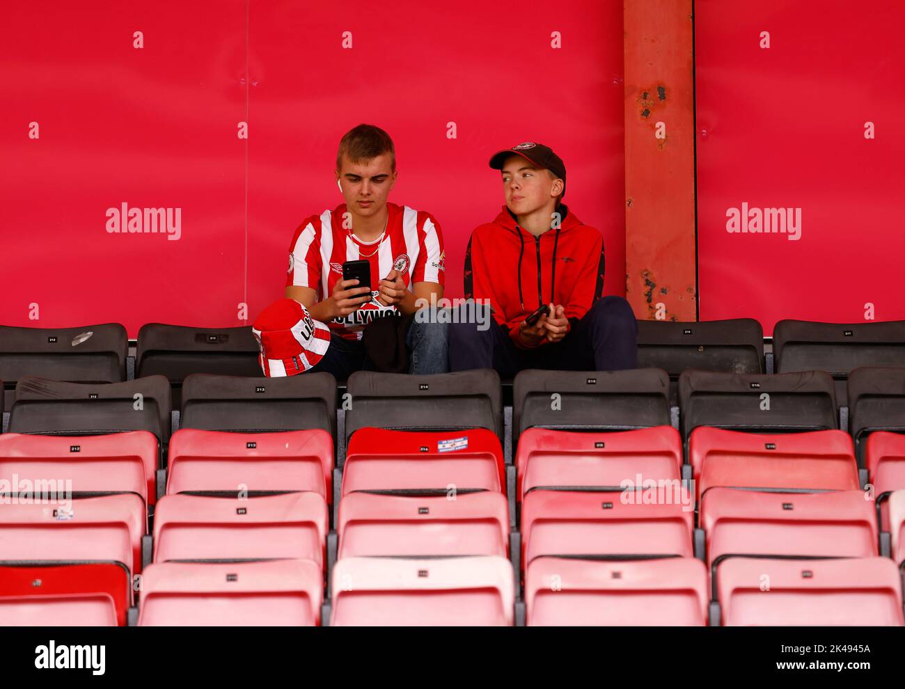 Brentford fans in the stands before the Premier League match at the Vitality Stadium, Bournemouth. Picture date: Saturday October 1, 2022. Stock Photo