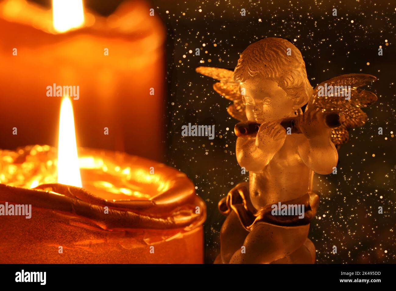 Christmas Angel Making Music In Front Of Advent Wreath Stock Photo Alamy