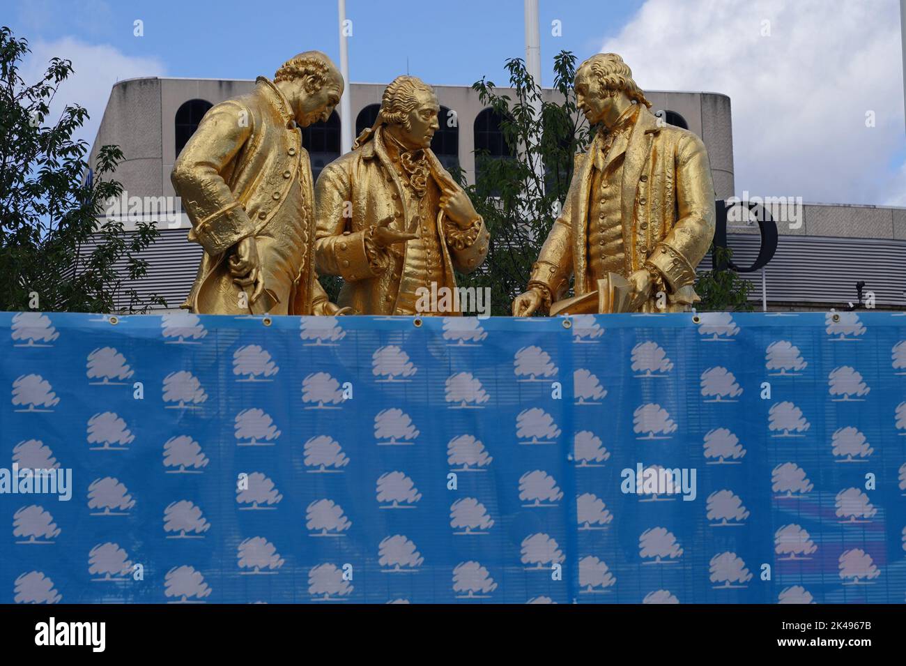 The Boulton, Watt and Murdoch statue is fenced off at the International Convention Centre in Birmingham ahead of the Conservative Party annual conference. Picture date: Saturday October 1, 2022. Stock Photo