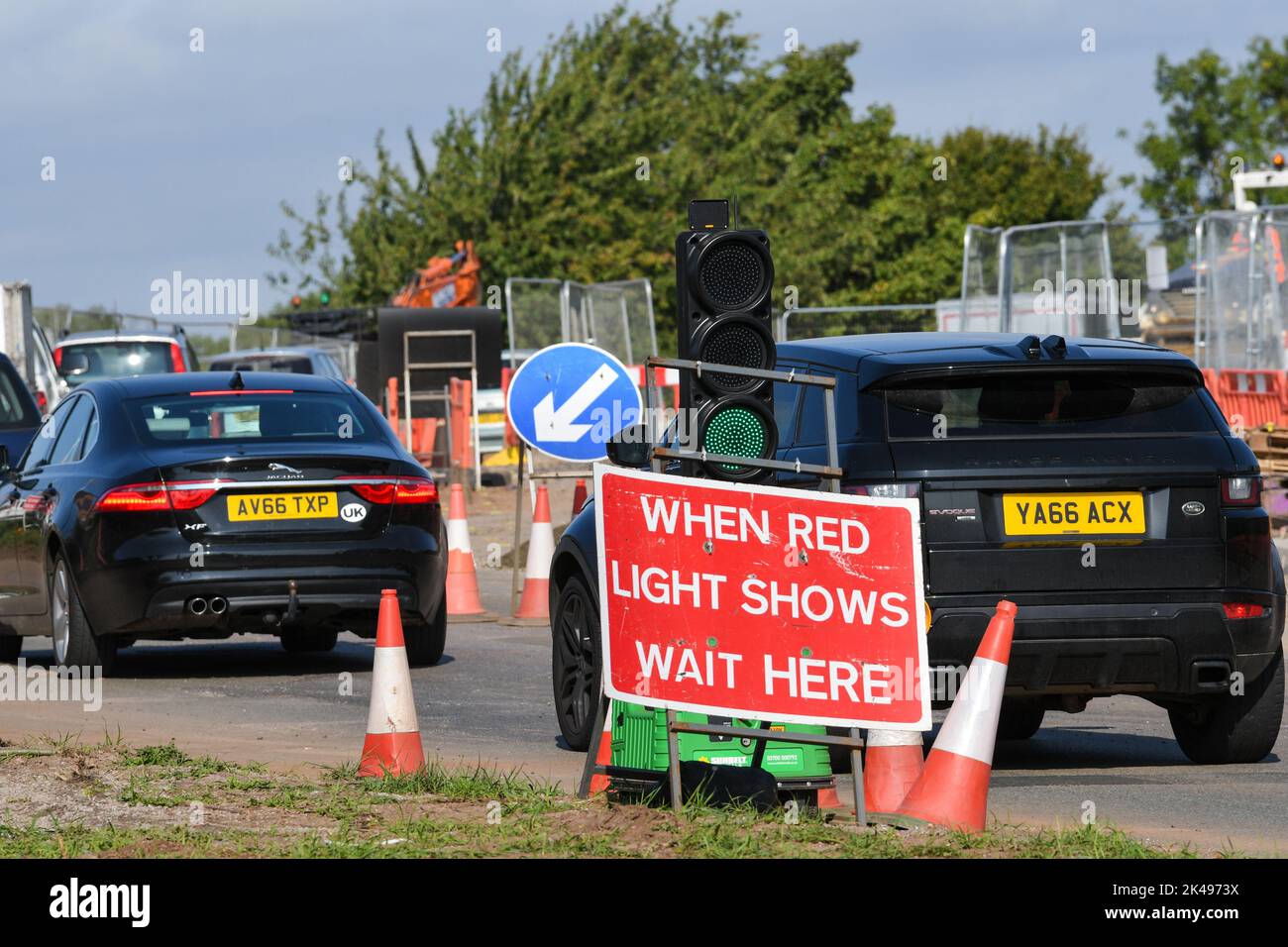 warning sign stop when red light shows Stock Photo Alamy