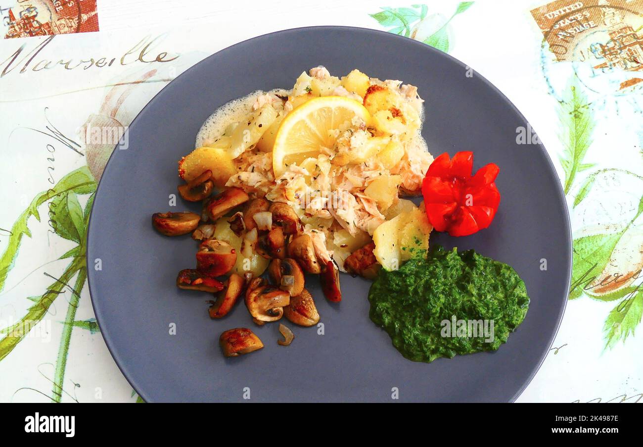 Salmon gratin with mushroom and spinach Stock Photo Alamy