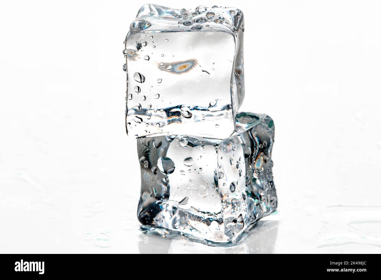 ice cubes on white background Stock Photo - Alamy