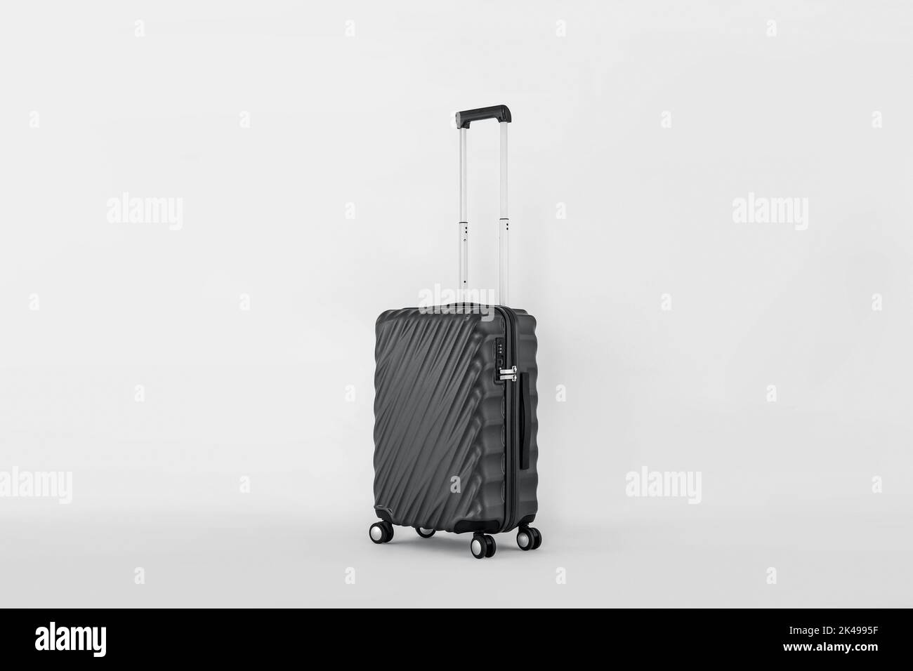 Black suitcase isolated on white background, vacation luggage Stock