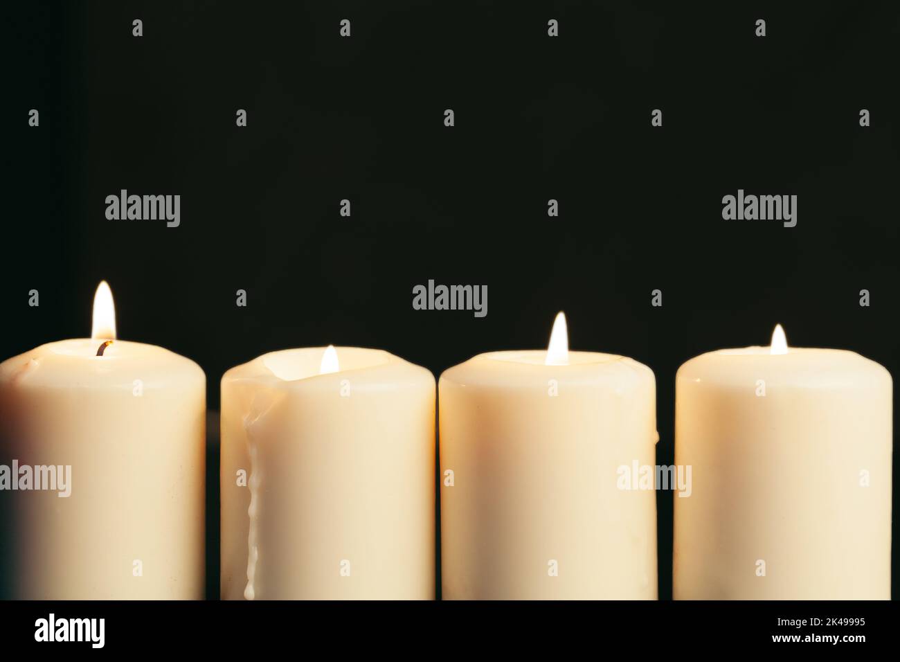 Candle flame close up on a black background Stock Photo - Alamy