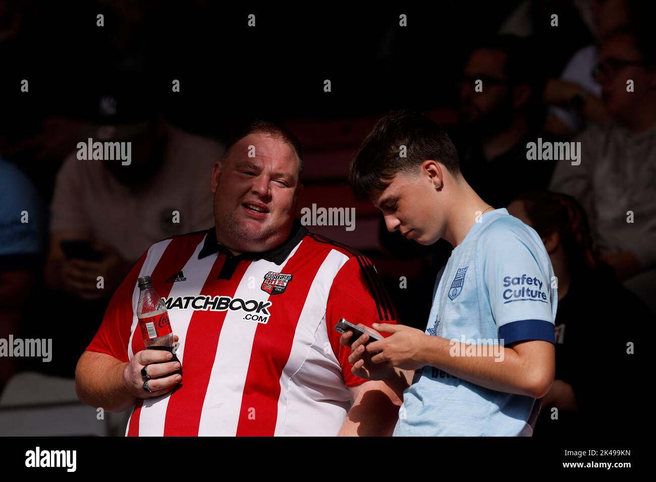 Brentford fans in the stands before the Premier League match at the Vitality Stadium, Bournemouth. Picture date: Saturday October 1, 2022. Stock Photo