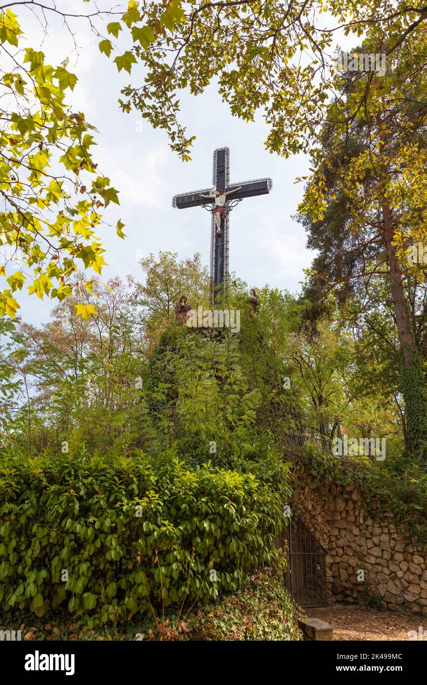 holy croos between the trees in Brive france Stock Photo