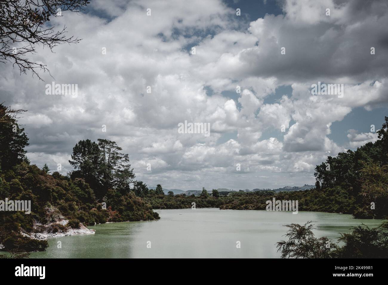 white clouds and blue sky over rotorua lake Stock Photo