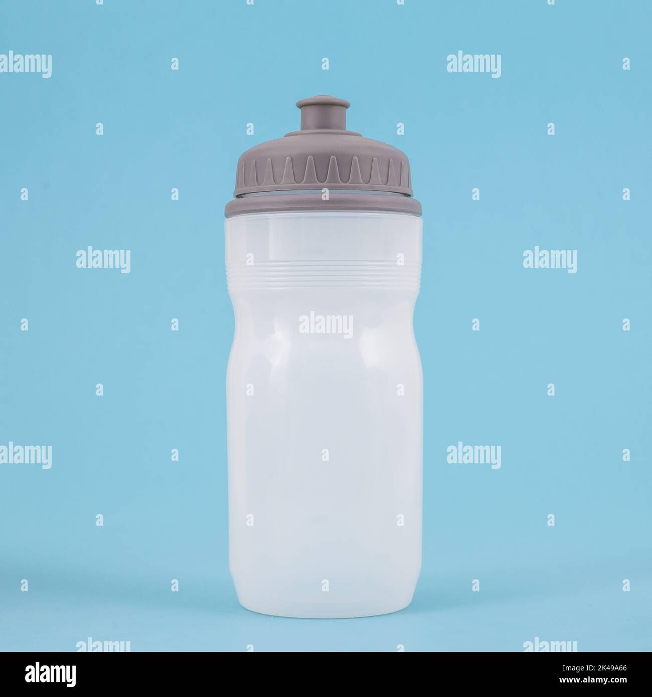 https://c8.alamy.com/comp/2K49A66/plastic-sport-water-bottle-isolated-on-blue-background-for-drinking-2K49A66.jpg