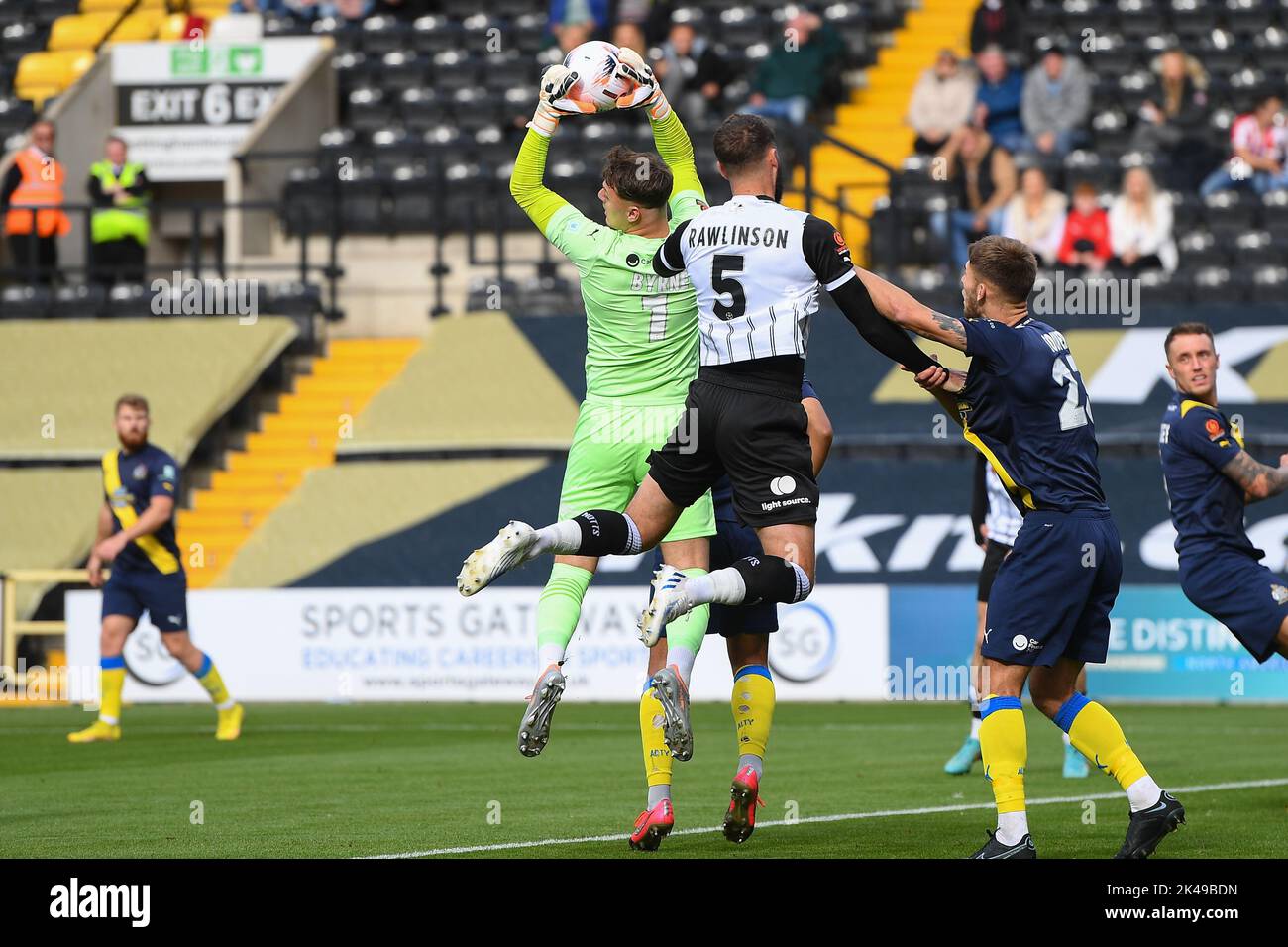 Nottingham, UK. 1st October 2022Oliver Byrne of Altrincham saves the ball under pressure from Connell Rawlinson of Notts County during the Vanarama National League match between Notts County and Altrincham at Meadow Lane, Nottingham on Saturday 1st October 2022. (Credit: Jon Hobley | MI News) Credit: MI News & Sport /Alamy Live News Stock Photo