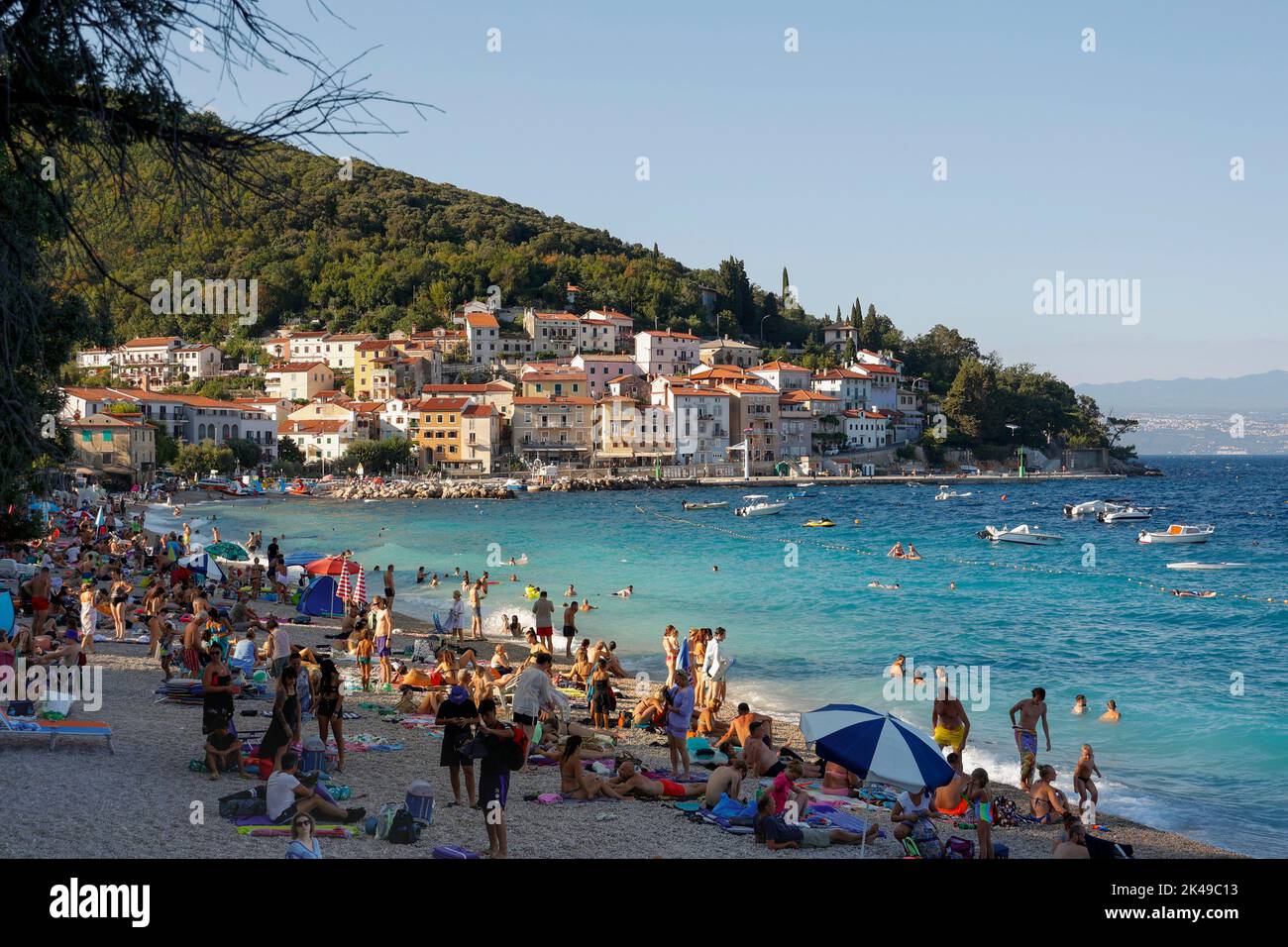 People on Moscenicka Draga beach in the late afternoon,Croatia,Europe. Stock Photo
