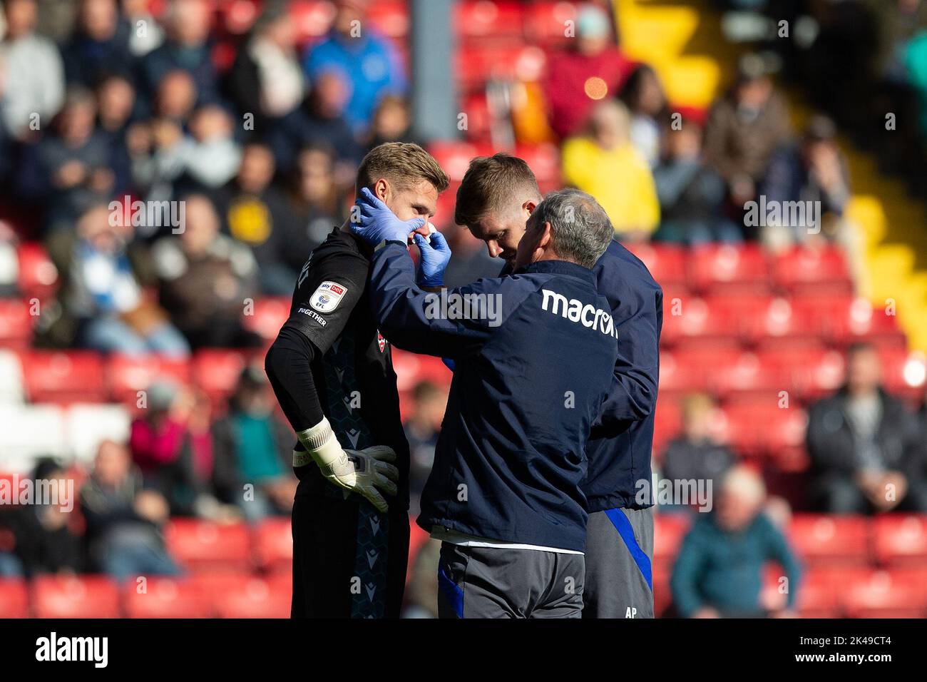 Thomas Kaminski #1 of Blackburn Rovers receives treatment during the Sky Bet Championship match Blackburn Rovers vs Millwall at Ewood Park, Blackburn, United Kingdom, 1st October 2022  (Photo by Phil Bryan/News Images) Stock Photo